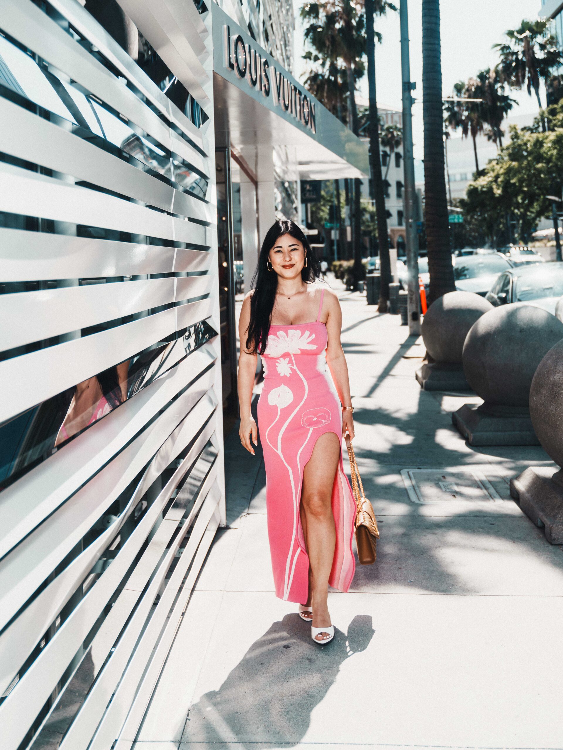 Close-up portrait of Tammy Veneza in pink dress on Rodeo Drive Beverly Hills, luxury editorial photography by Johnny Hann