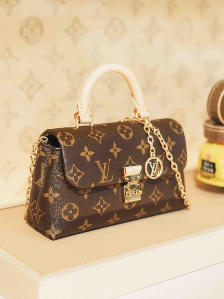 Louis Vuitton Open PM leather handbag close-up inside Rodeo Drive Beverly Hills flagship store at 295 N Rodeo Drive photographed by Johnny Hann